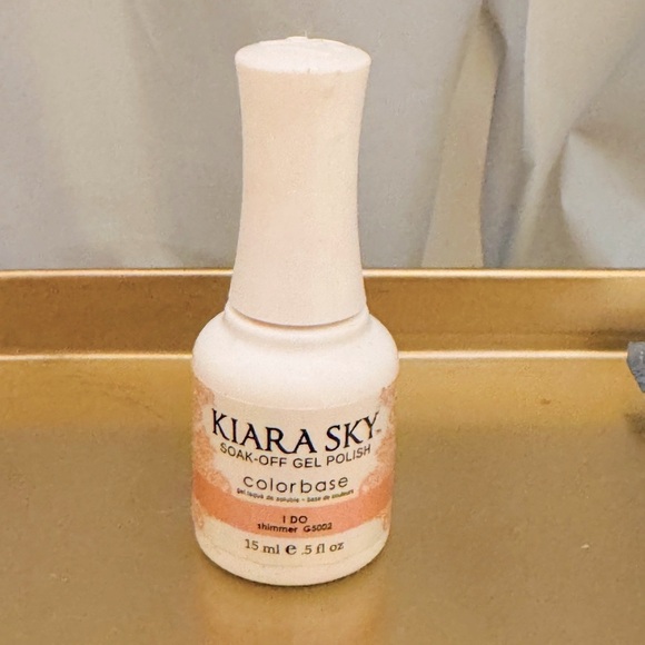 Kiara Sky soak off gel 

Color base nail lacquer in the color I do pink  shimmer - Picture 4 of 8